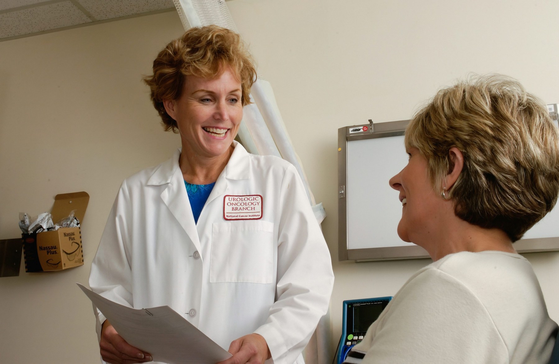 A clinician speaking with a patient in a welcoming consultation; illustrative photograph